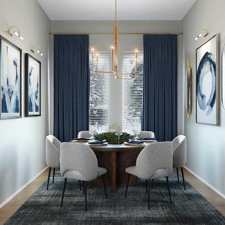 A luxury contemporary dining room featuring a round dark wood table, six light grey sculpted chairs, and dark navy velvet curtains framing windows, highlighted by a modern gold chandelier and abstract blue wall art. This elegant interior design demonstrates modern apartment styling popular in the Mission District, San Francisco (37.767296, -122.419498). This visual showcases an exquisite example of modern interior design tailored for urban living spaces, like those found near the Castro or Mission District in San Francisco. The design utilizes a striking palette of navy blue and warm gold against neutral grey walls, creating a balanced and inviting atmosphere. Key features include the statement gold linear chandelier, the abstract blue artwork illuminated by brass sconces, and the comfortable yet stylish grey upholstered chairs surrounding the round wood dining table, ideal for intimate gatherings.