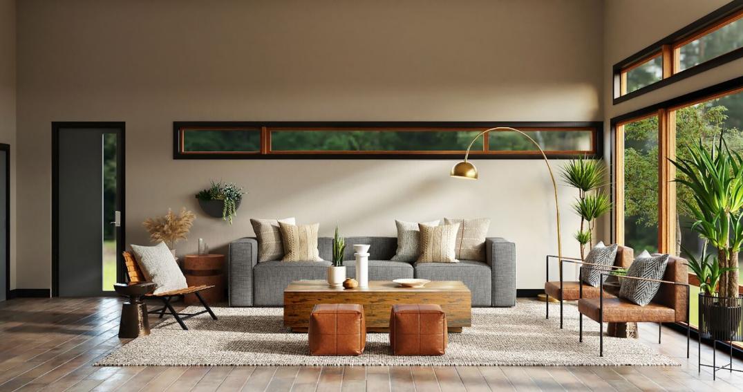 Modern minimalist living room interior featuring a gray sectional sofa, warm wood coffee table, and cognac leather accent chairs, brightly lit by floor-to-ceiling windows, showcasing luxury home staging and interior design concepts near the Mission District, San Francisco. This inviting contemporary living room exemplifies modern California design with its clean lines and earthy palette. The space features a cozy gray sofa balanced by structured leather seating, set against a backdrop of large windows that flood the room with natural light. This design emphasizes indoor-outdoor living, a popular aesthetic for upscale homes and real estate listings in the San Francisco area, offering sophisticated comfort.