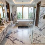 Why Calacatta Viola is the “It” Stone for a Red Marble Bathroom